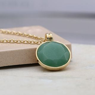 Gold Pendant with Large Green Faceted Stone Set
